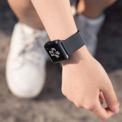 Black Milanese Stainless Steel Band for Apple Watch worn on wrist